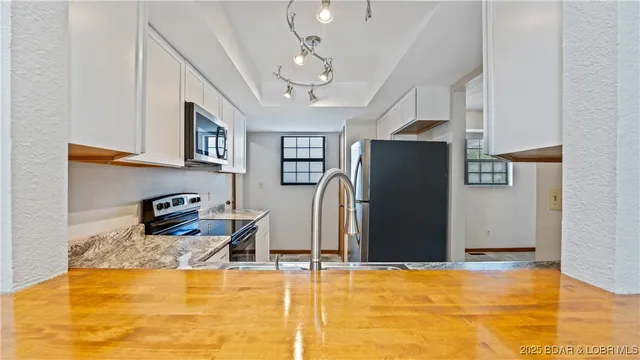 $330,000 | 56 Copper Ridge Dr Lake, Unit 1F, Lake Ozark, MO 65049