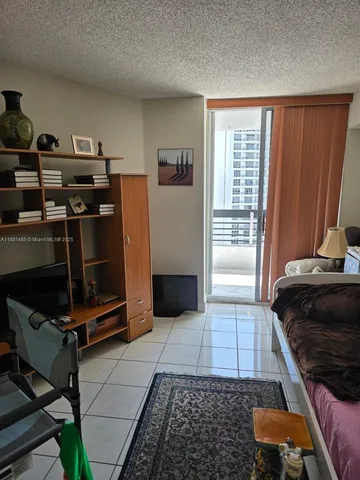 an aerial view of a house with outdoor space