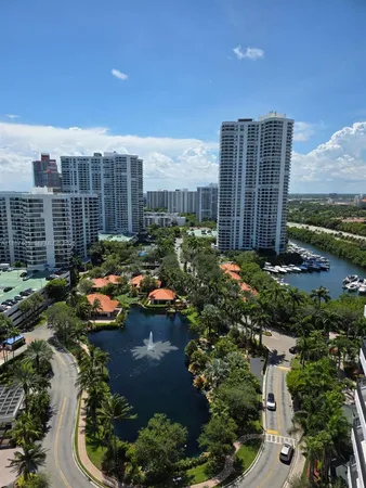 a view of a city with tall buildings