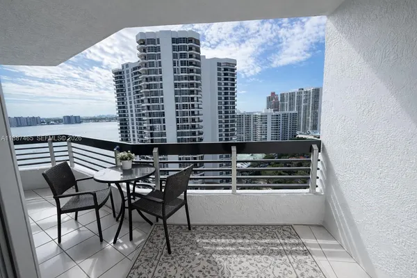 a view of a balcony with an outdoor space