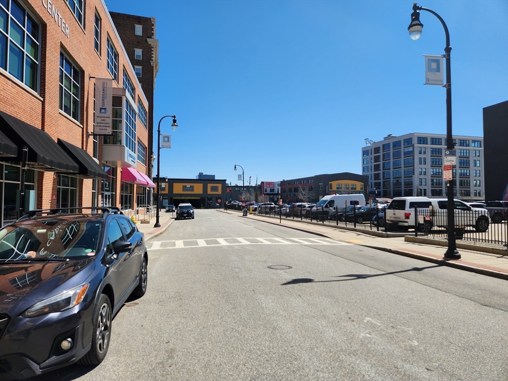 17 Federal Street, Unit 506 Worcester, MA 01608 - Photo 15 of 17 a city street with tall buildings