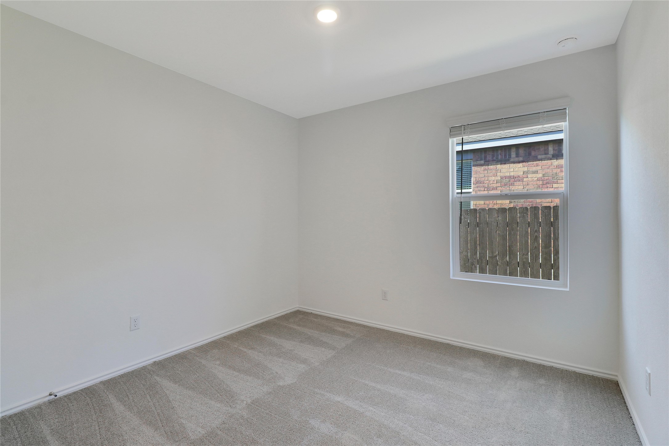 2524 Four Waters Loop Georgetown, TX 78628 - Photo 26 of 36 an empty room with a window