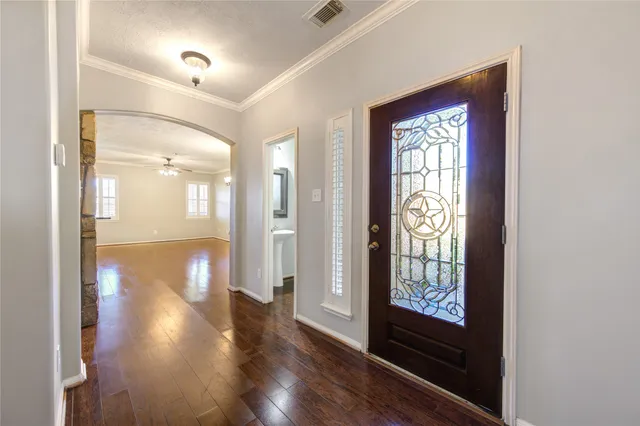 a view of entryway with wooden floor