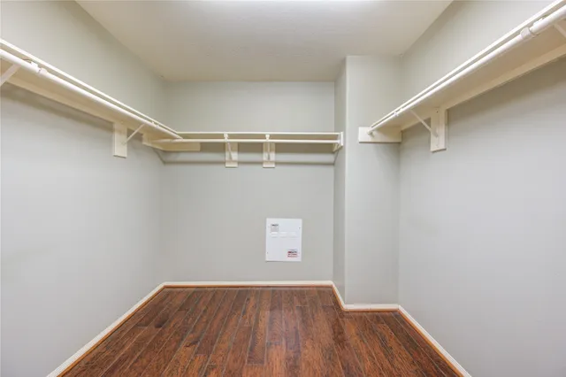 a view of an empty walk in closet