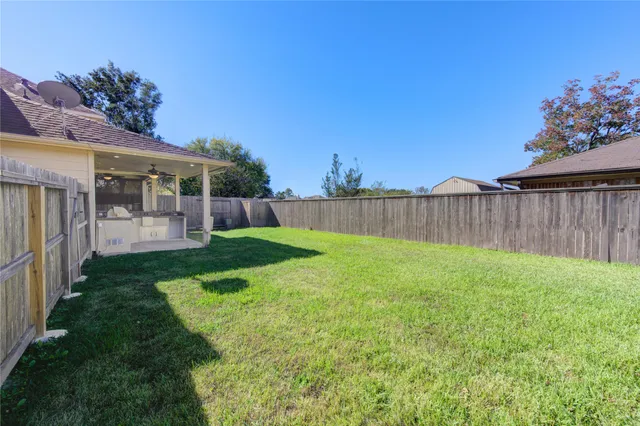 a view of a backyard with a garden