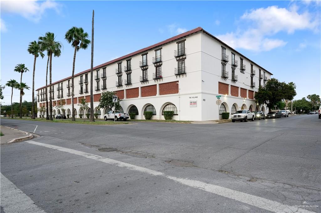 a view of street with building in the background