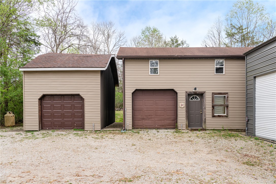 6750 Little Twin Road Germantown, OH 45327 - Photo 49 of 88 This property features multiple outbuildings with ample parking, providing versatile space for various needs.