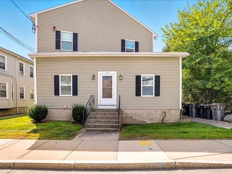 848 Waverly Street, Unit 4 Framingham, MA 01702 - Photo 1 of 14 a view of a house with a yard