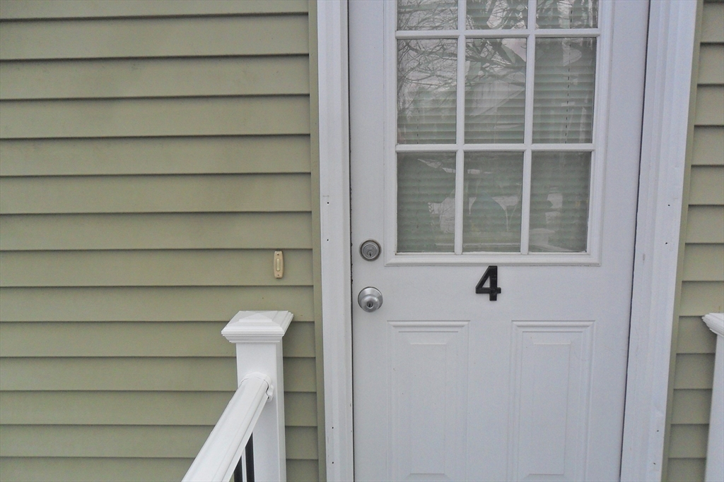 848 Waverly Street, Unit 4 Framingham, MA 01702 - Photo 2 of 14 a view of front door