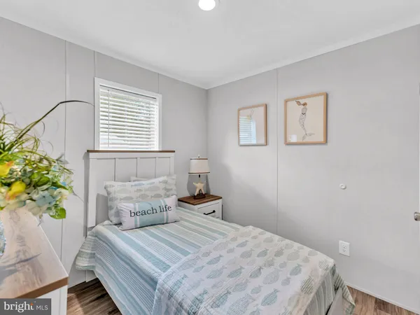 a large white bed in a white room