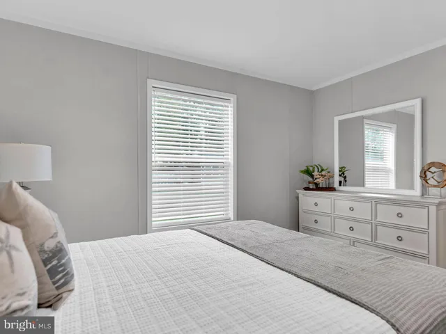 a bathroom with a sink a vanity and a mirror