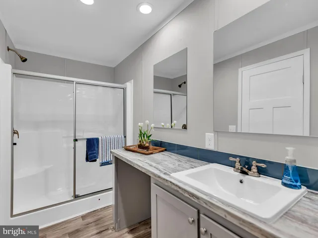 a view of a deck with a wooden fence