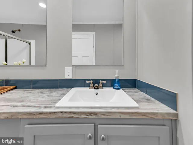 a view of a road with a building in the background