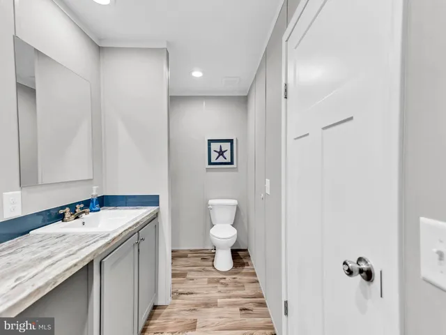 a picture of a bench in a white building