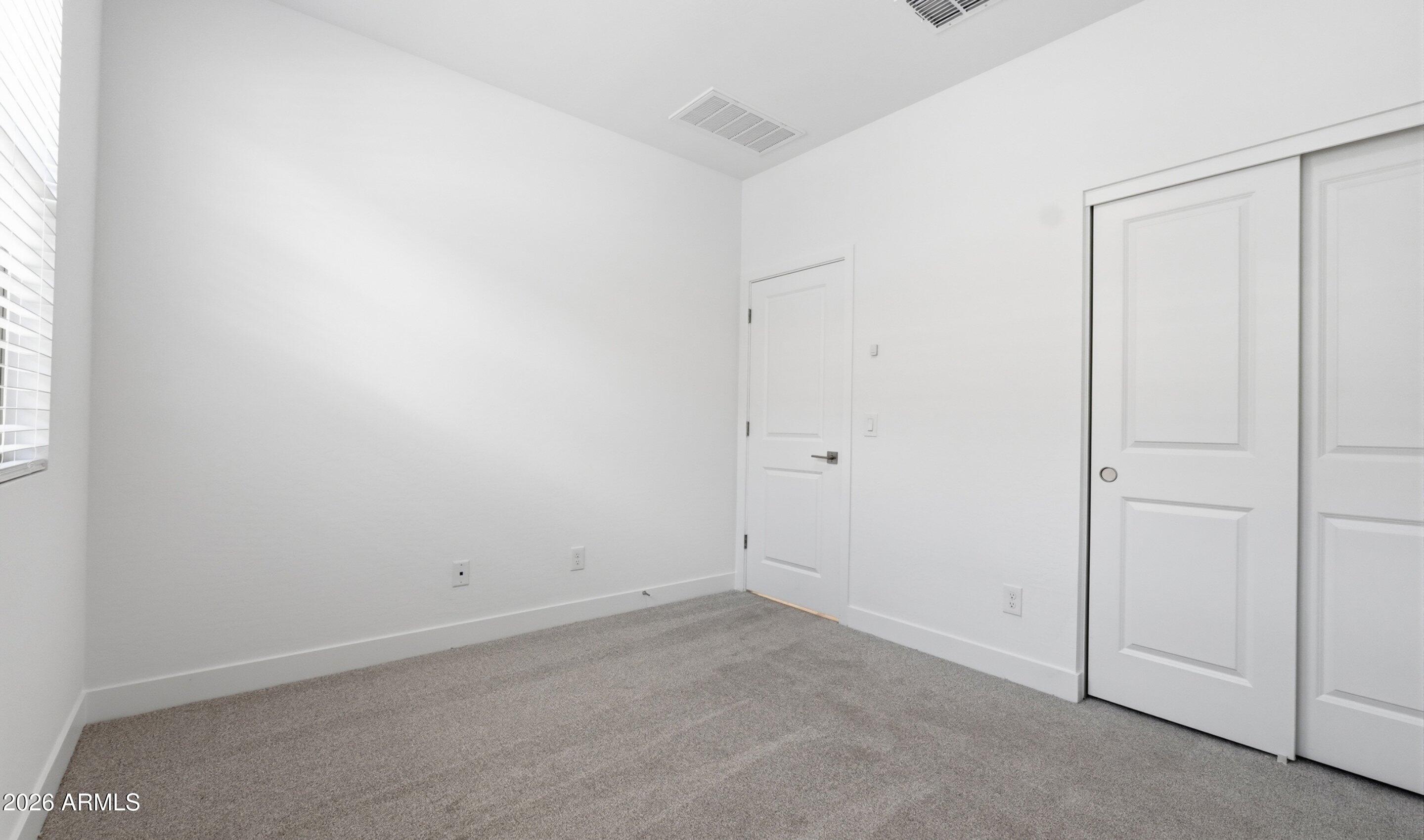 7779 West Sands Road Glendale, AZ 85303 - Photo 22 of 37 an empty room with an entryway