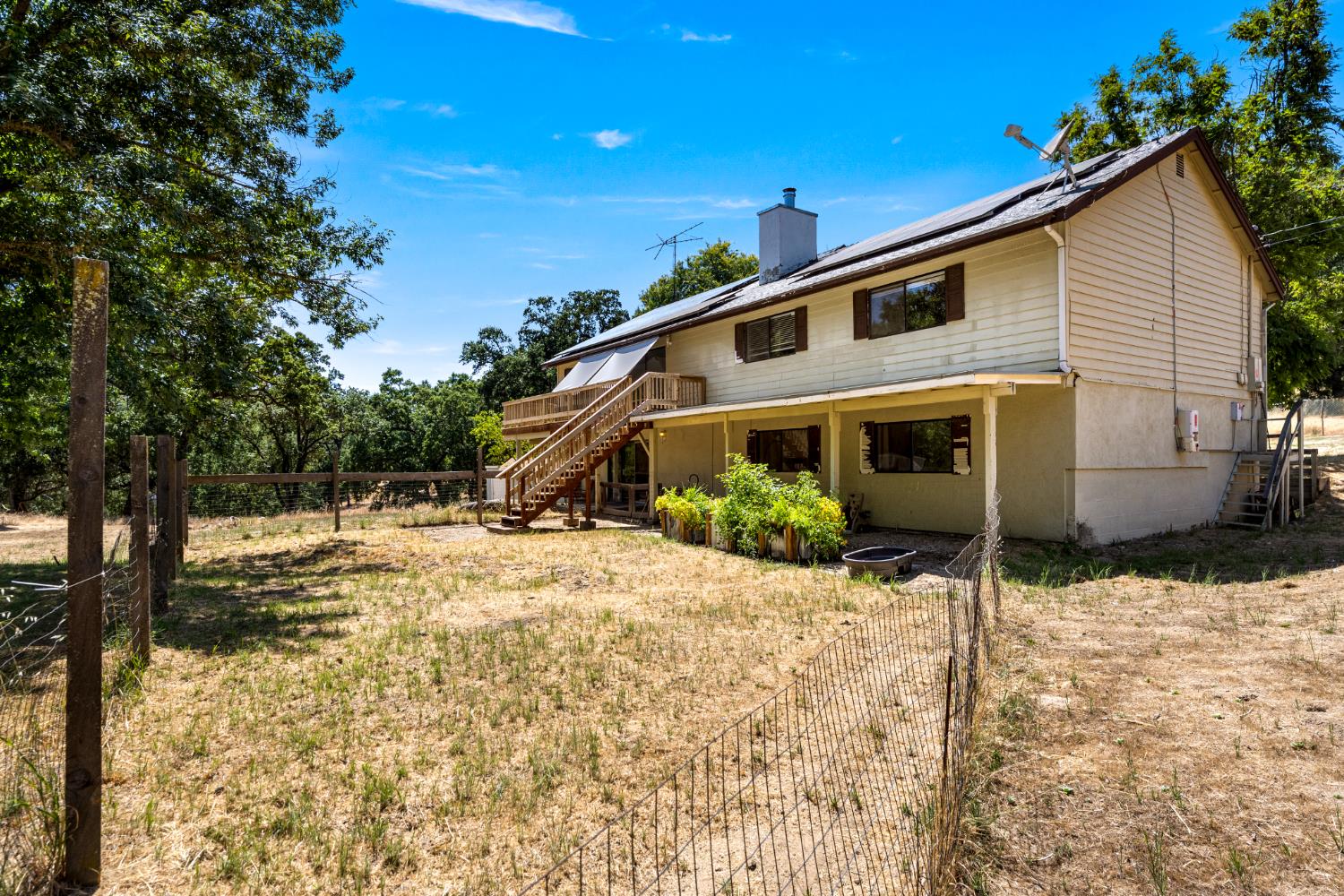 2162 Painted Pony Road Somerset, CA 95684 - Photo 53 of 65 a front view of a house with a yard
