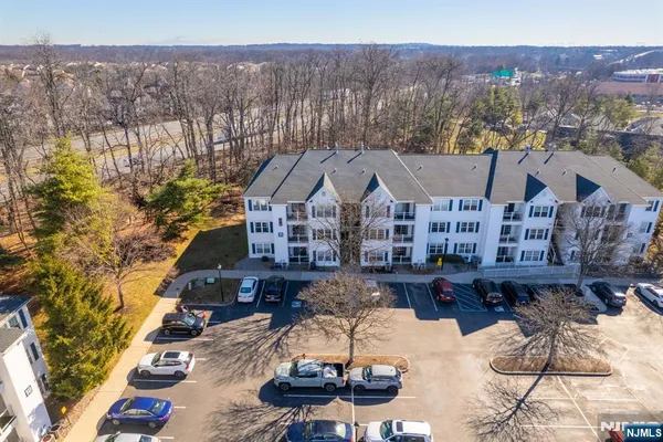 a picture of a bench in front of a wall