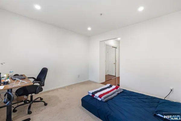 a room with furniture and wooden floor