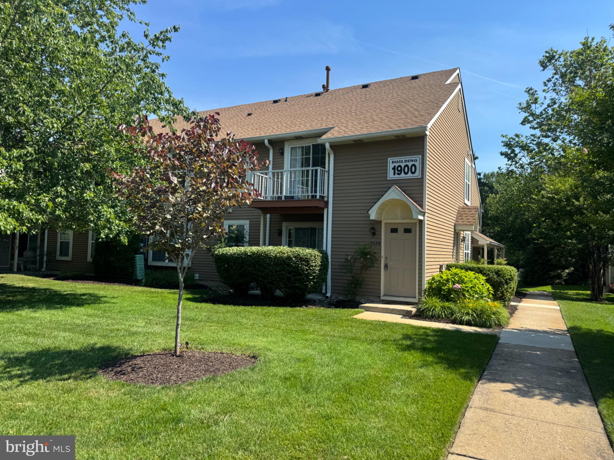 1908 B Ralston Drive Mount Laurel, NJ 08054 - Photo 1 of 21 a front view of a house with garden