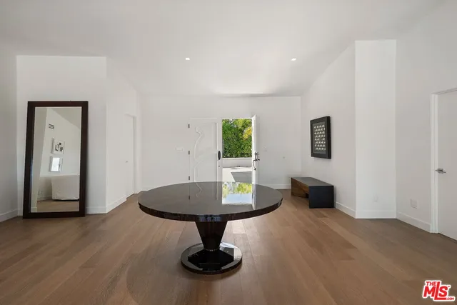 a living room with furniture and view of living room