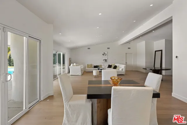 a kitchen with stainless steel appliances granite countertop a stove and a sink