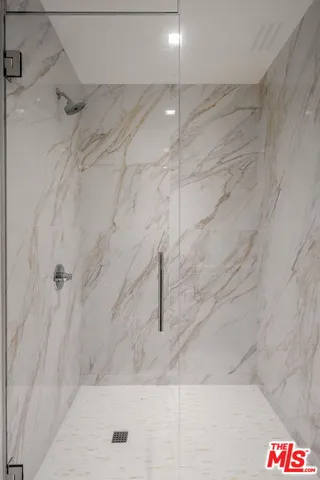 a front view of house with yard and swimming pool