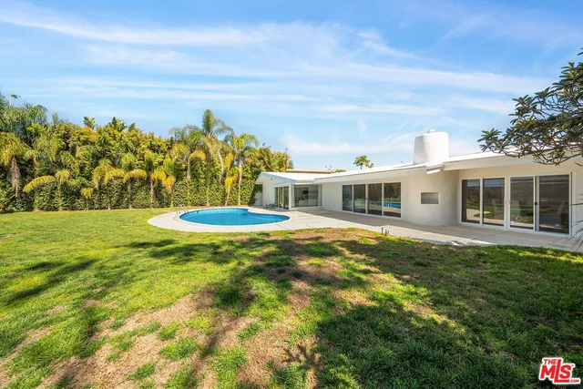 a view of building with garden space