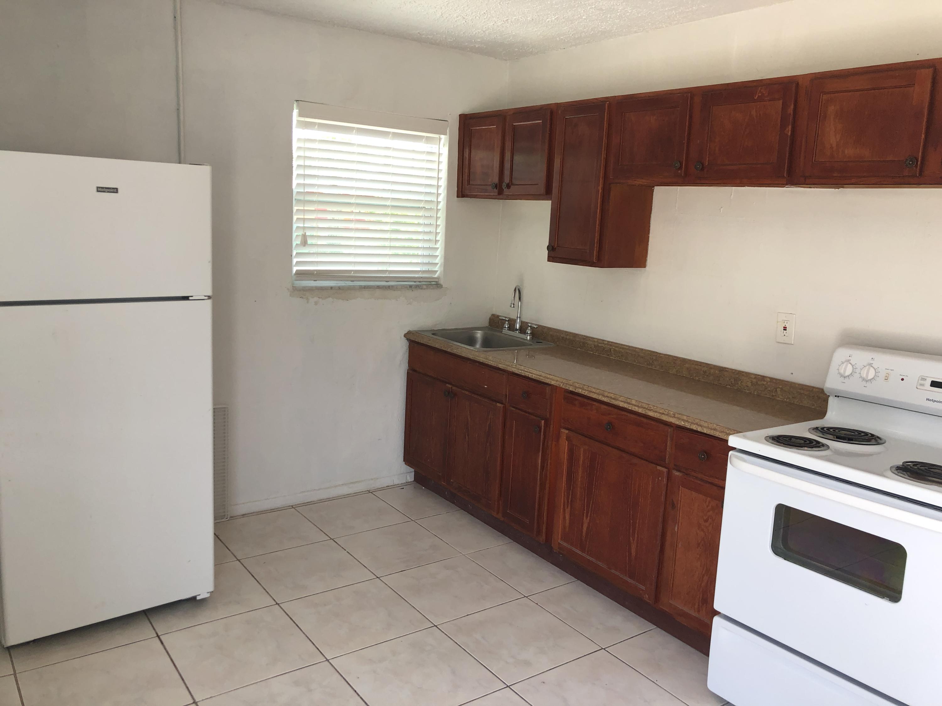 184 West 24th Street Riviera Beach, FL 33404 - Photo 15 of 27 IMG_4845