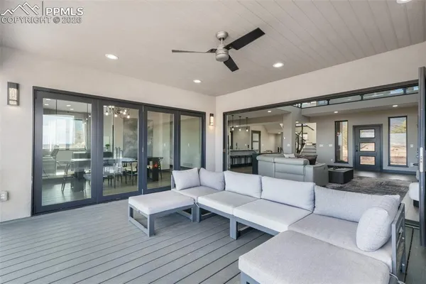 a living room with furniture and a table