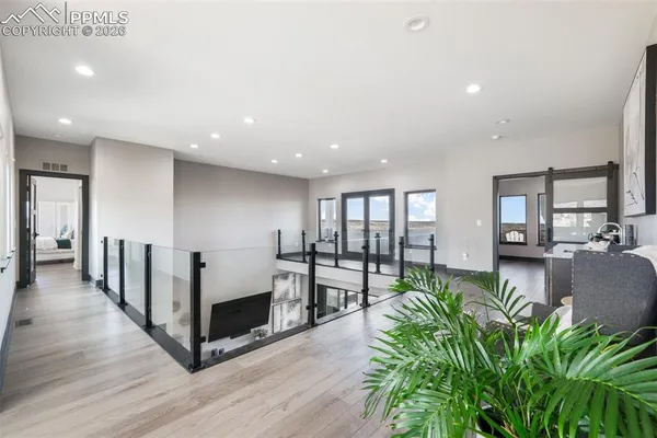 a view of a living room and entryway