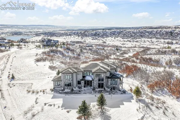 an aerial view of beach and city