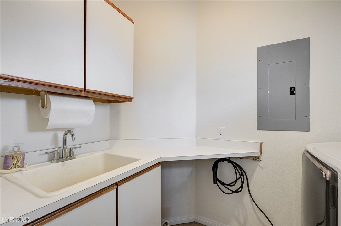2955 El Camino Road Las Vegas, NV 89146 - Photo 32 of 99 Washroom featuring electric panel and washer and dryer