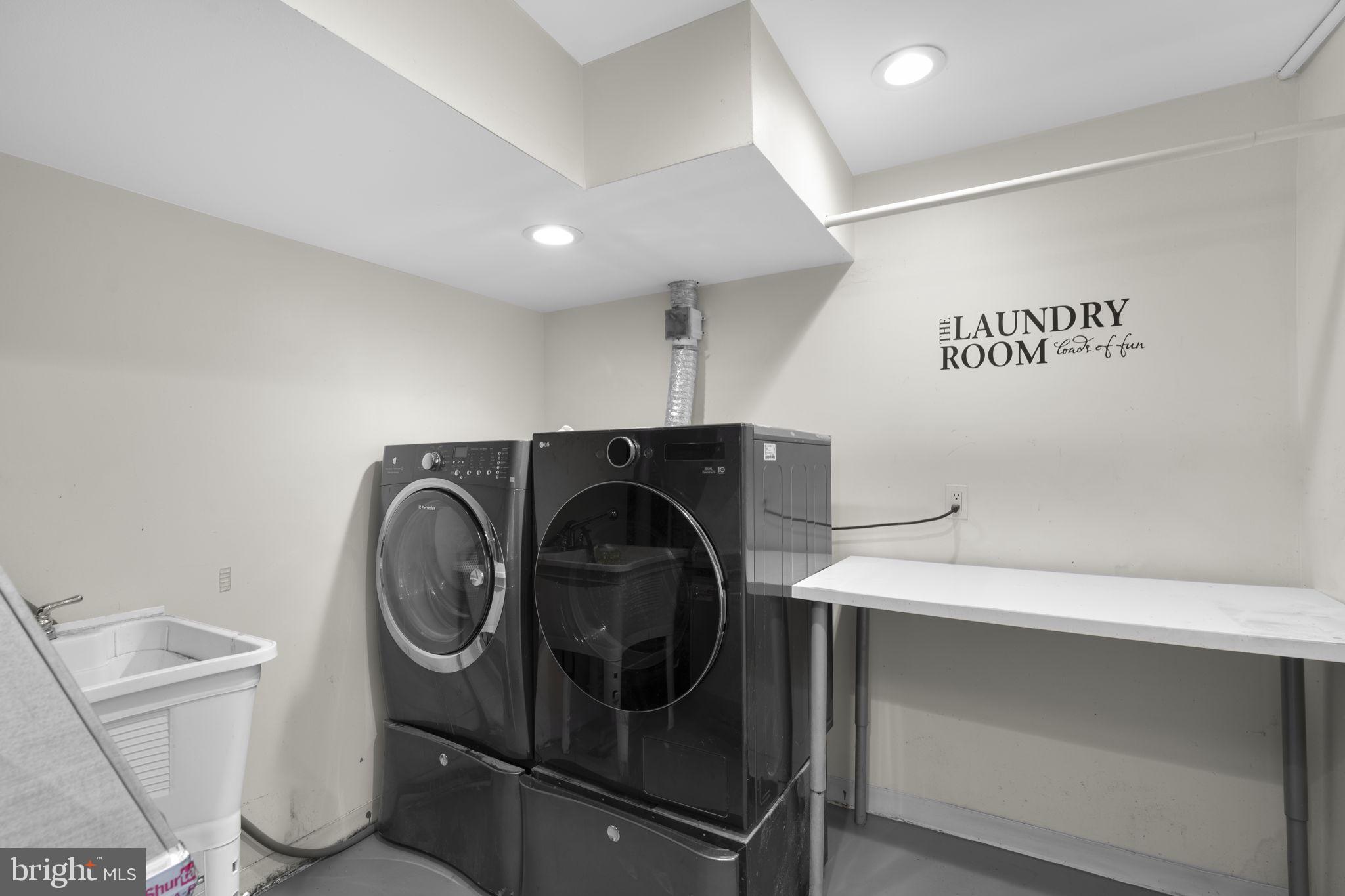 822 Loxford Terrace Silver Spring, MD 20901 - Photo 51 of 61 a utility room with dryer and washer