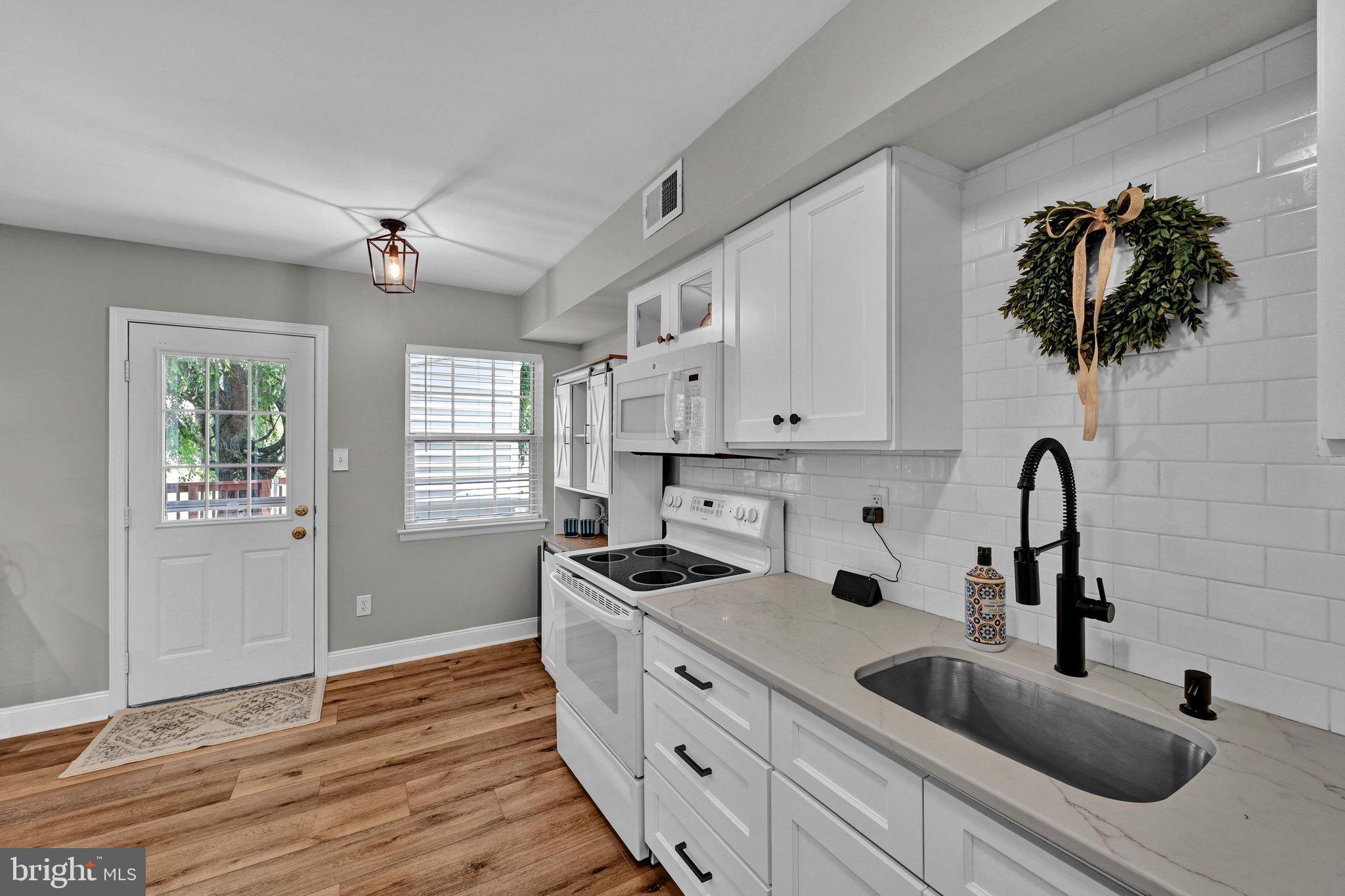 720 Springfield Court Downingtown, PA 19335 - Photo 10 of 36 Kitchen - Leads to Back Deck