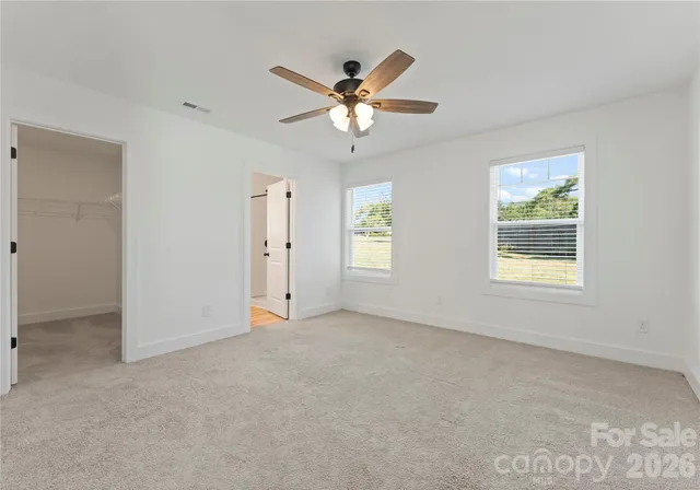a bathroom with a double vanity sink and mirror