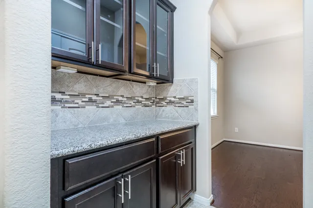 a view of a microwave and sink