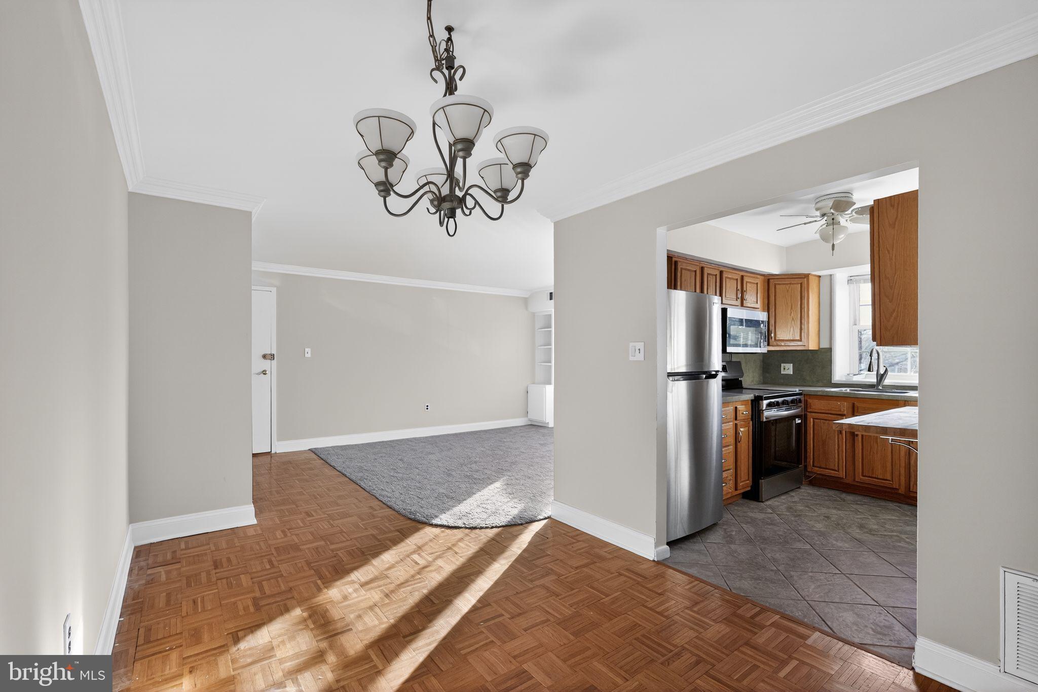 800 South Avenue, Unit B4 Secane, PA 19018 - Photo 6 of 16 a view of a kitchen with a sink stainless steel appliances and cabinets