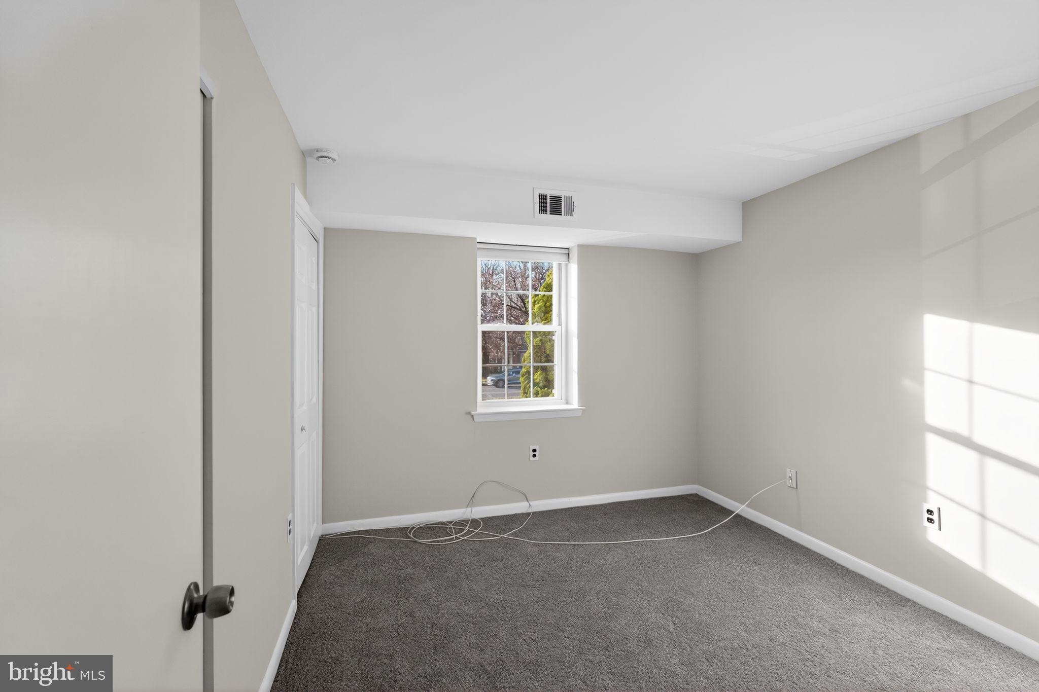 800 South Avenue, Unit B4 Secane, PA 19018 - Photo 9 of 16 an empty room with windows