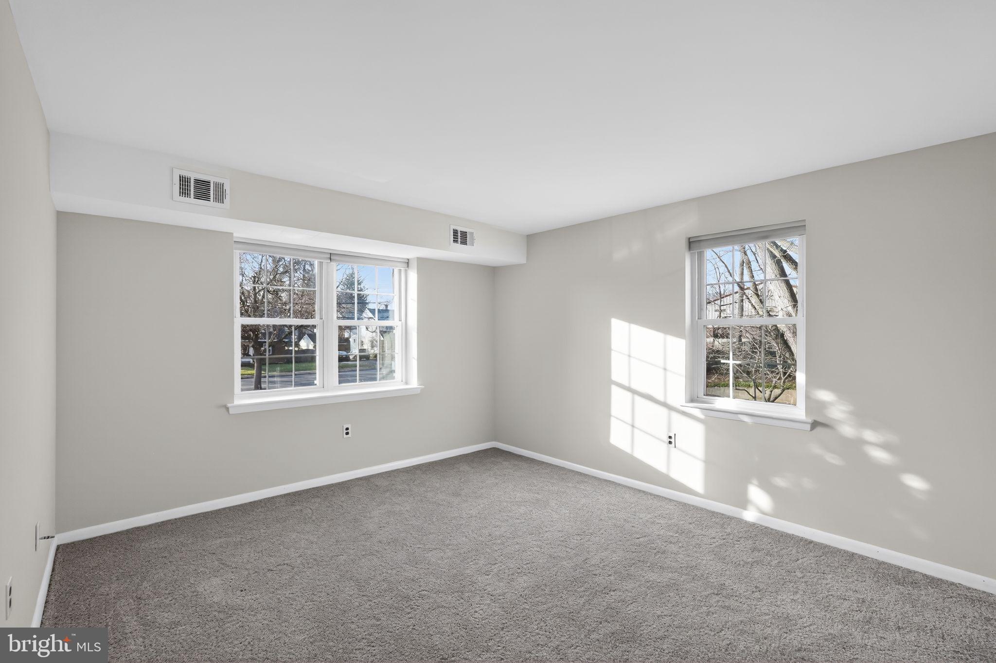 800 South Avenue, Unit B4 Secane, PA 19018 - Photo 10 of 16 a view of an empty room with a window