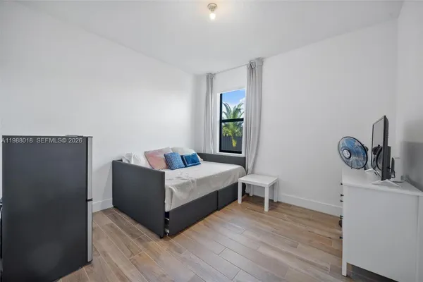 a living room with furniture and a window