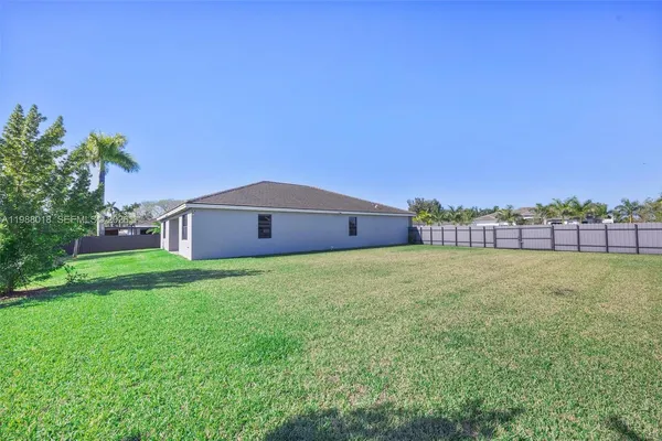 a view of a house with a big yard