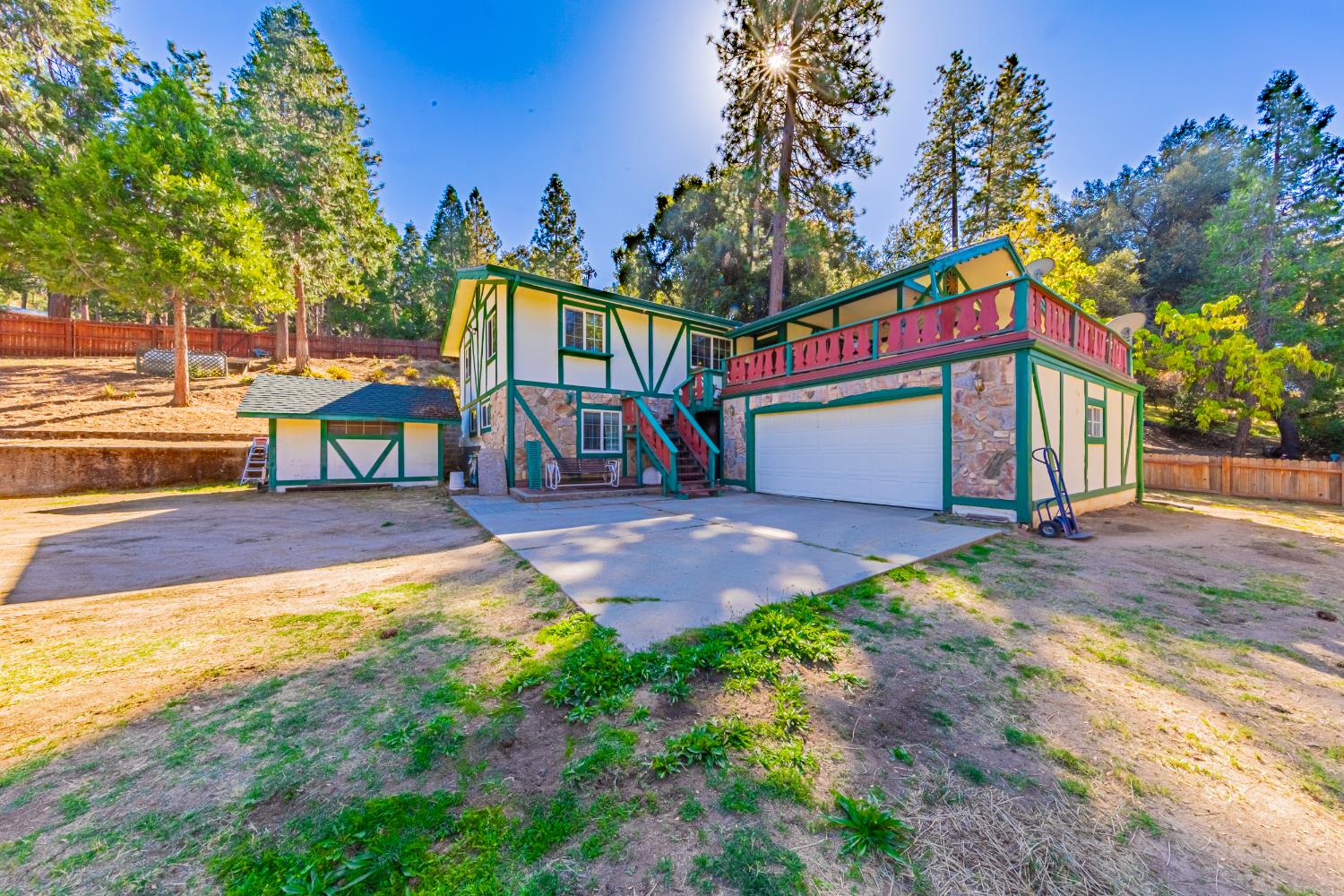 42585 Buckeye Road Oakhurst, CA 93644 - Photo 41 of 55 a view of a house with basketball court