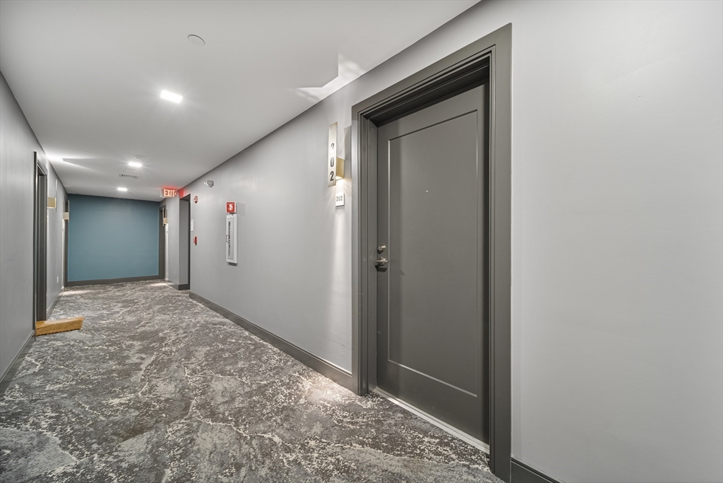 11 Walley Street, Unit 202 Boston, MA 02128 - Photo 20 of 24 a view of hallway