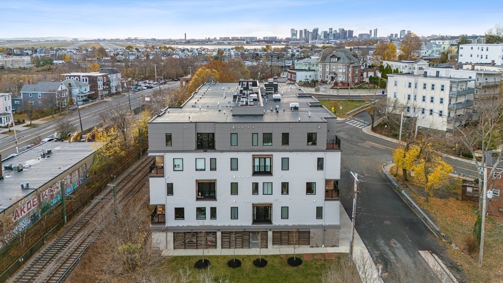 11 Walley Street, Unit 202 Boston, MA 02128 - Photo 2 of 24 a view of a large building