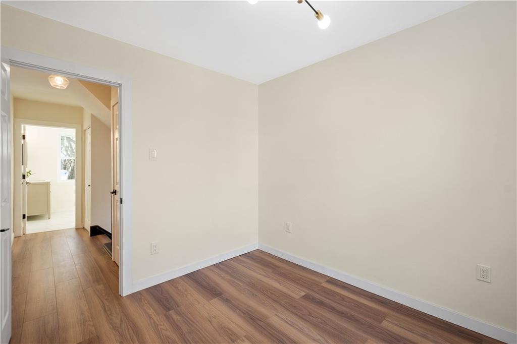 1206 Beechview Avenue Pittsburgh, PA 15216 - Photo 17 of 39 a view of a room with wooden floor