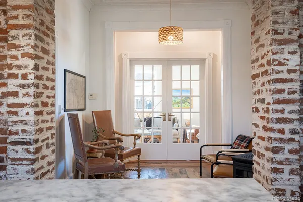 a living room with furniture and a window
