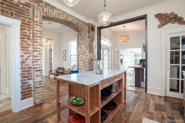 a kitchen with a stove and a wooden cabinets
