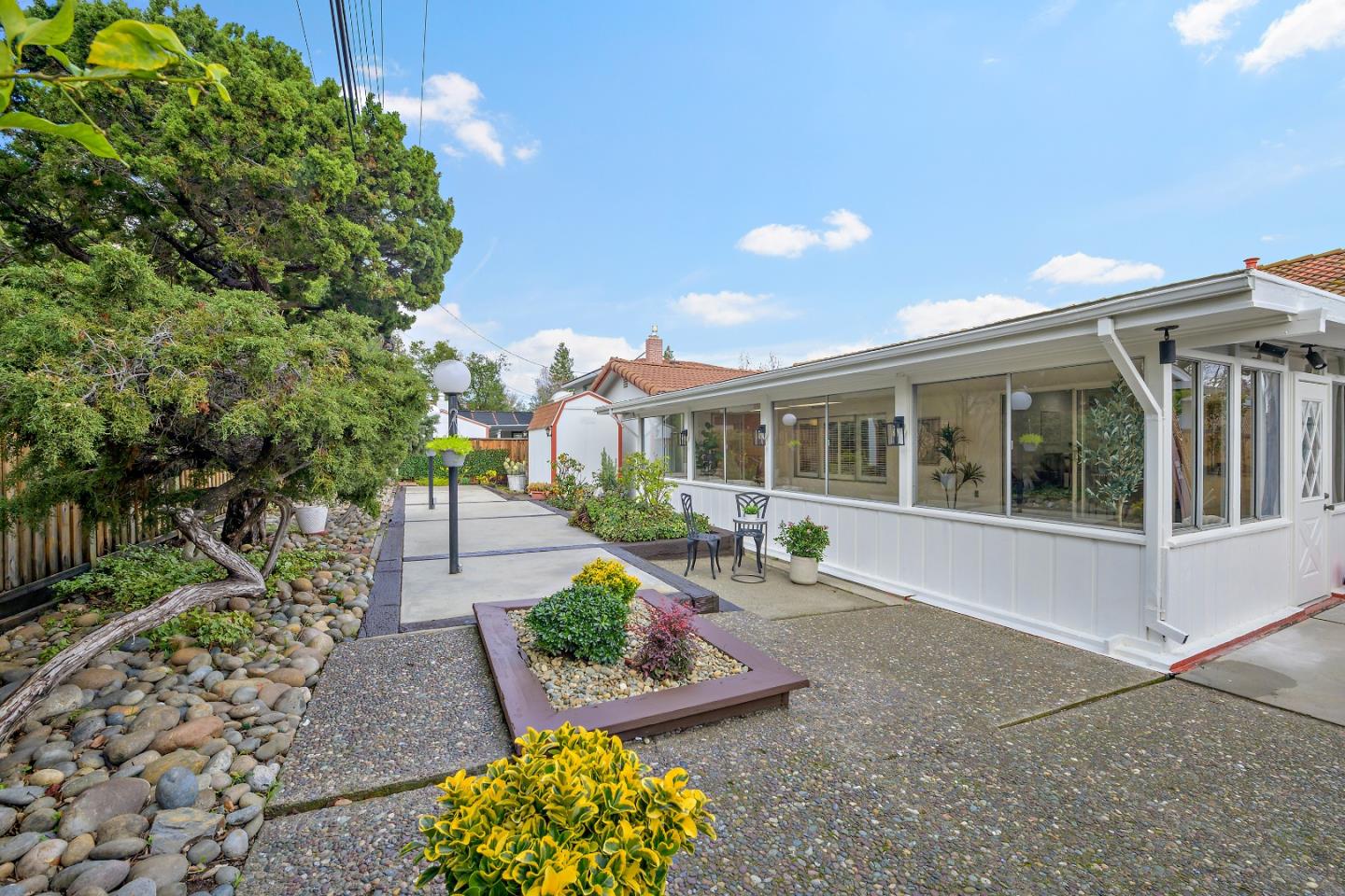 10275 Farallone Drive Cupertino, CA 95014 - Photo 17 of 17 a front view of a house with garden