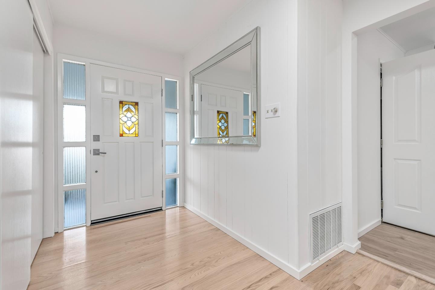 10275 Farallone Drive Cupertino, CA 95014 - Photo 3 of 17 a view of hallway with wooden floor