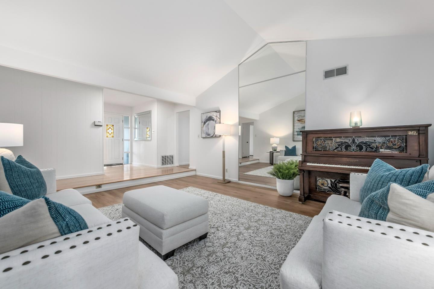 10275 Farallone Drive Cupertino, CA 95014 - Photo 5 of 17 a living room with furniture and a fireplace